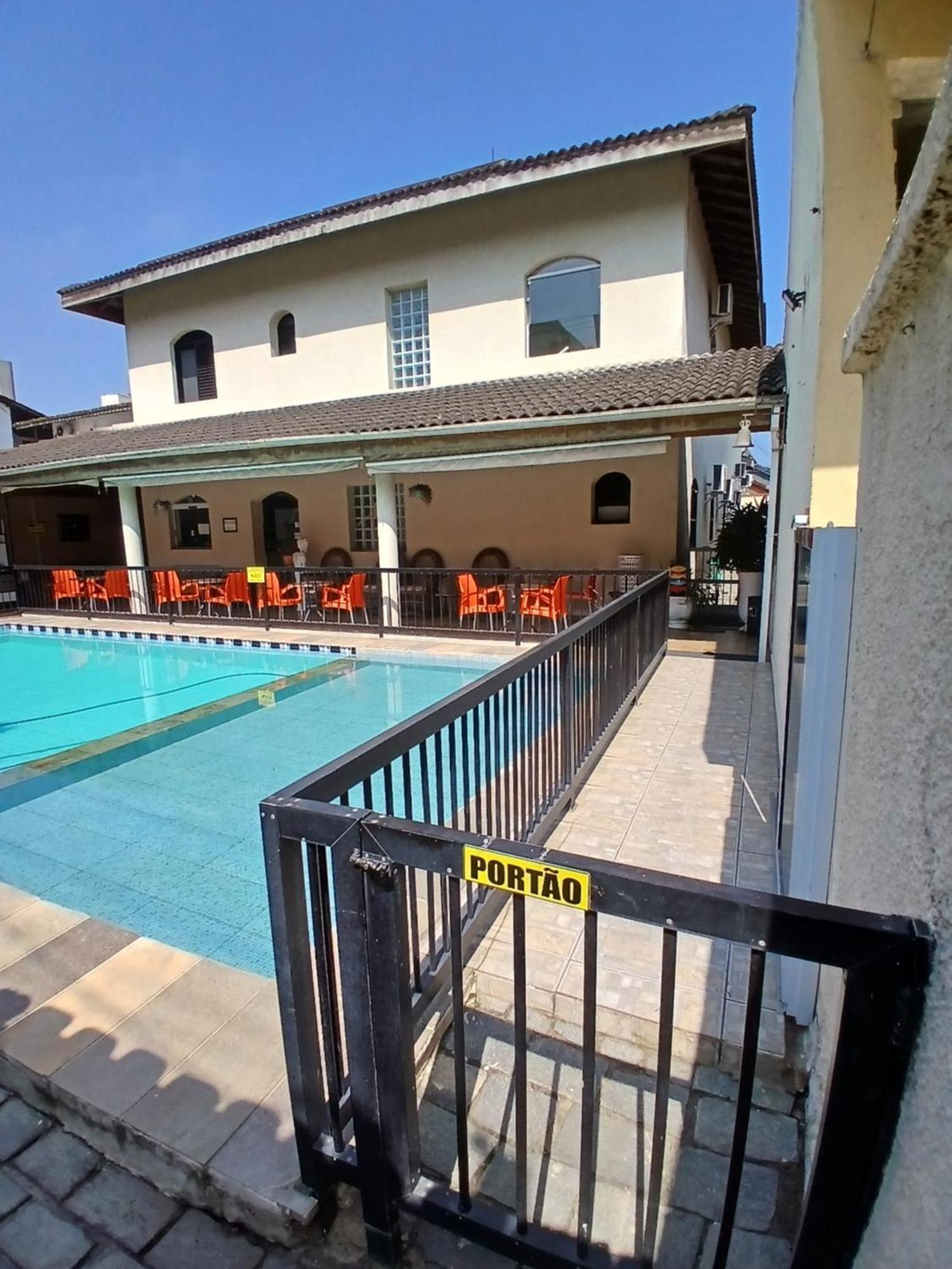 Pousada Parque Suites Estacionamento E Piscina Guaruja Ngoại thất bức ảnh